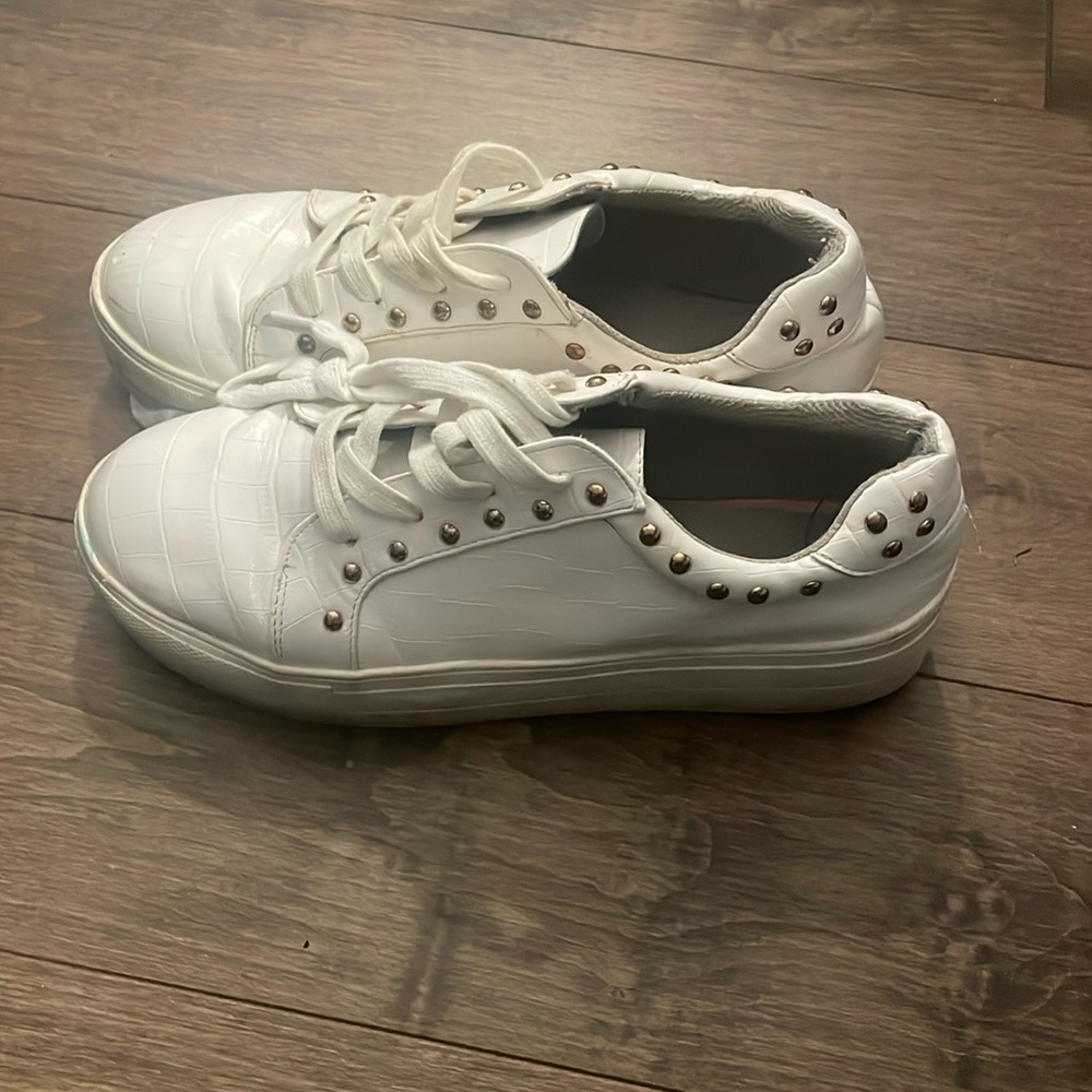 White and gold sneakers